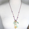 Long beaded necklace with multiple pendant charms in amethyst, fluorite, chrysoprase and prehnite stones. Designed and handcrafted by Ula Frou creator Sadie Hodson on Salt Spring Island. 