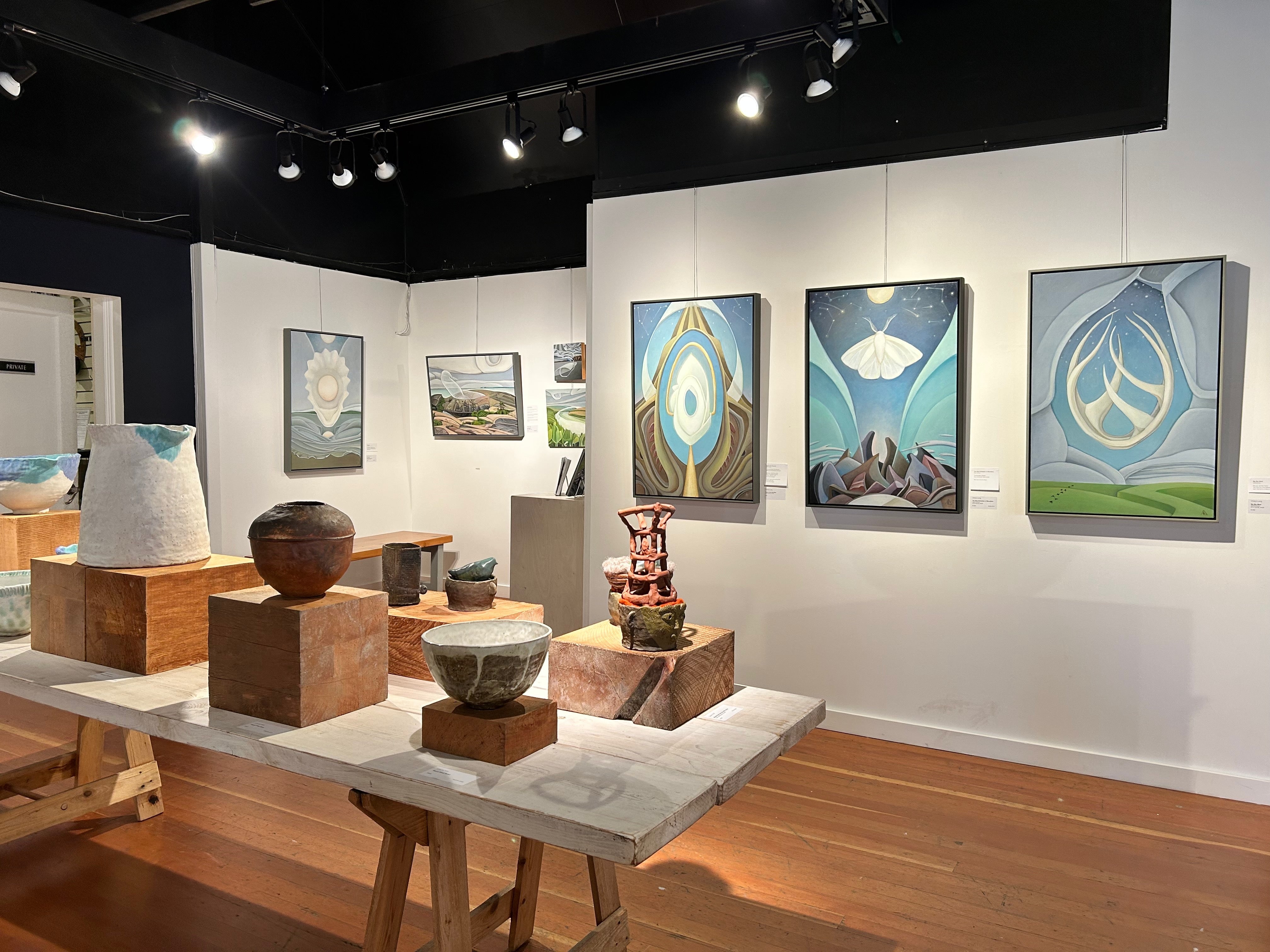 Mystic landscapes and earthy vessels transport viewers