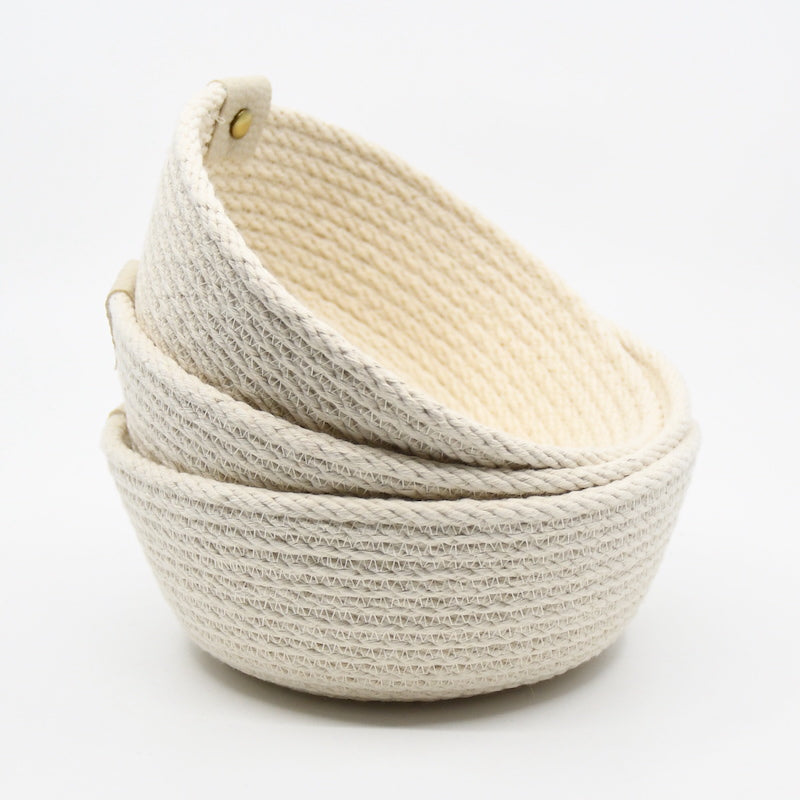 Baskets sewn from 100% cotton rope, machine sewn and hand dyed using plant-based dyes handmade by designer Andromeda Nelson on Salt Spring Island.