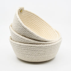 Baskets sewn from 100% cotton rope, machine sewn and hand dyed using plant-based dyes handmade by designer Andromeda Nelson on Salt Spring Island.