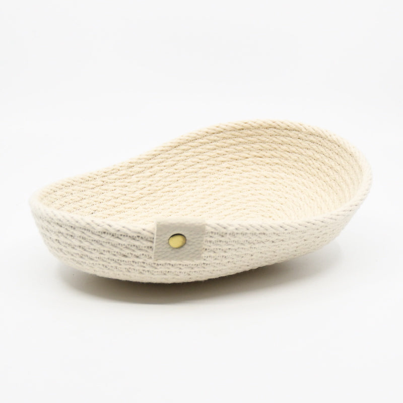 Rope basket tray sewn from 100% cotton rope, machine sewn and hand dyed in cream shade using only plant based dyes handmade by designer Andromeda Nelson on Salt Spring Island.