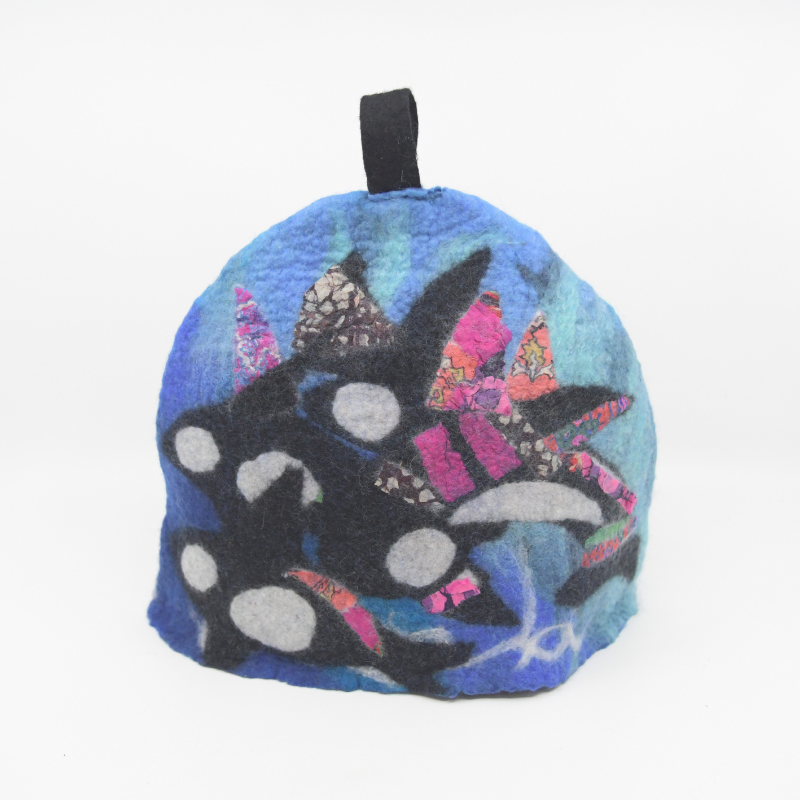 Handmade felt tea cozy with orca designs in merino and corriedale wool, by Pender Island fibre artist Debbie Katz. 