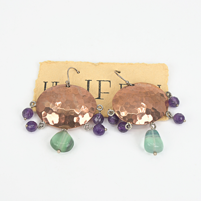 Hammered copper earrings with with fluorite and amethyst stones on sterling silver ear hooks. Designed and handcrafted by Ula Frou creator Sadie Hodson on Salt Spring Island. 