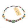 Colourful beaded necklace with turquoise, amethyst, carnelian, Lapis lazuli, and rose quartz stones, and beads made from bone, crystal, sterling silver, flame-worked and recycled glass. Designed and handcrafted by Ula Frou creator Sadie Hodson on Salt Spring Island. 